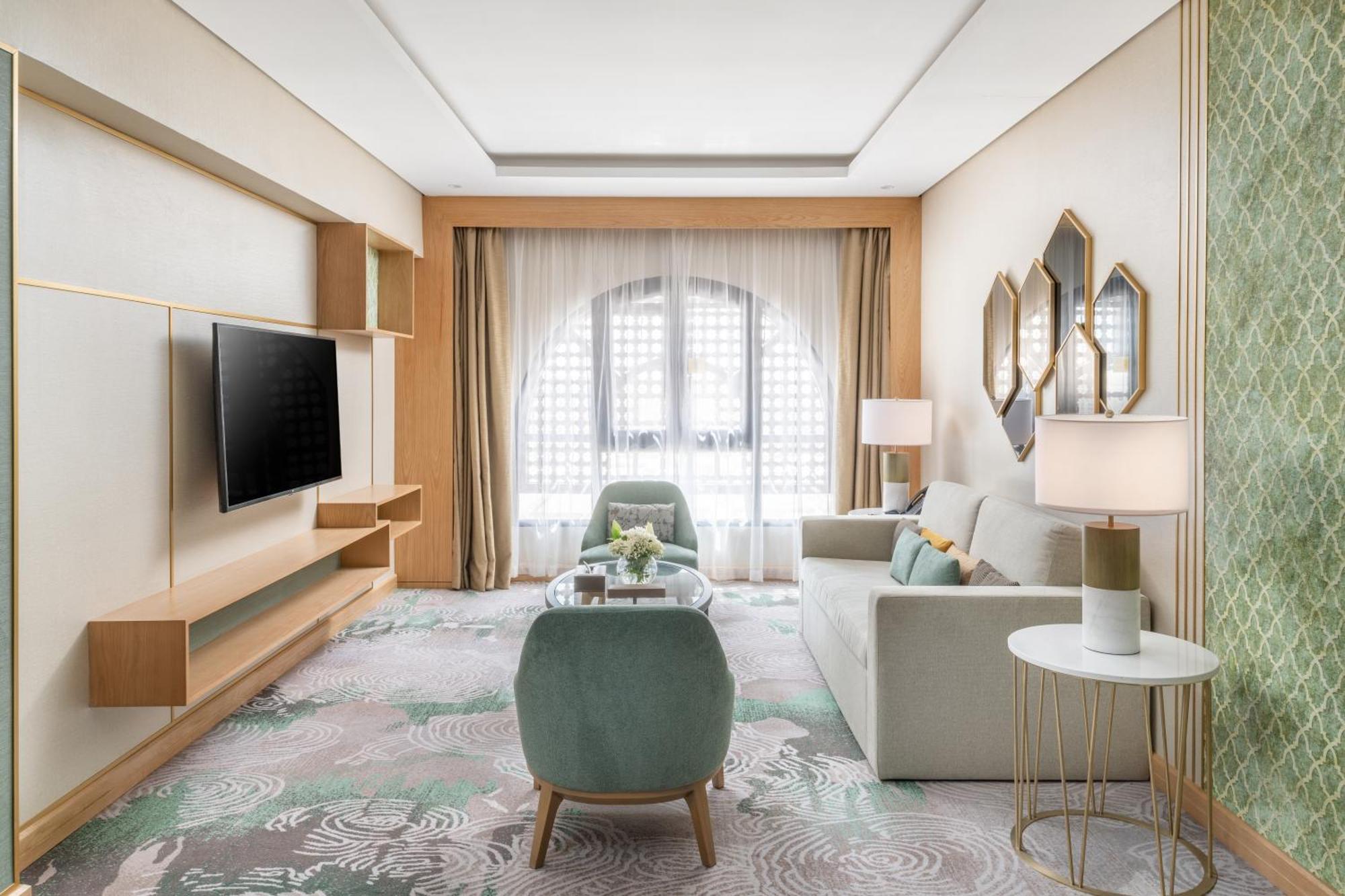 אל-מדינה Taiba Suites Madinah מראה חיצוני תמונה A living room at the hotel