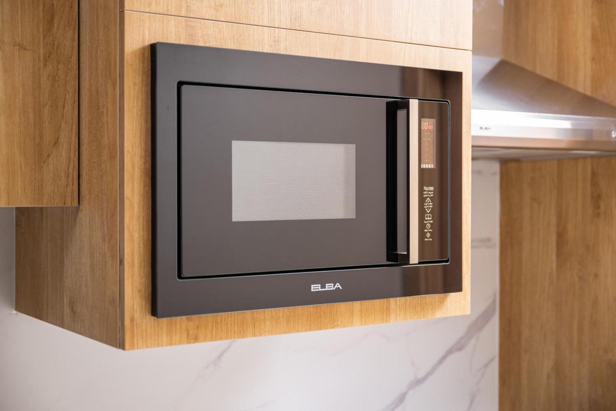 אל-מדינה Taiba Suites Madinah מראה חיצוני תמונה Microwaves are a common household appliance.